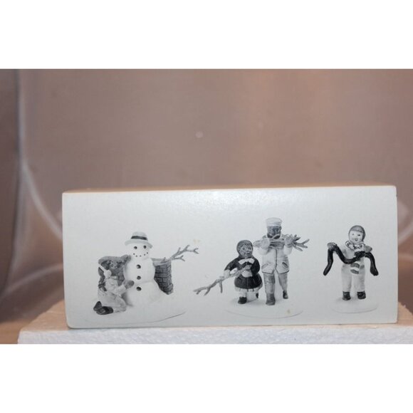 Dept 56 Christmas In the City - Playing in the Snow - Picture 1 of 8